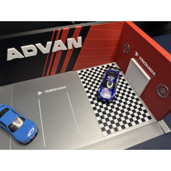 Mega Garage Advan grand format à l'échelle 1/64
